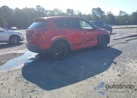 2015 Mazda Cx-5 Touring z USA, uszkodzony, nr VIN JM3KE4CY8F0480579